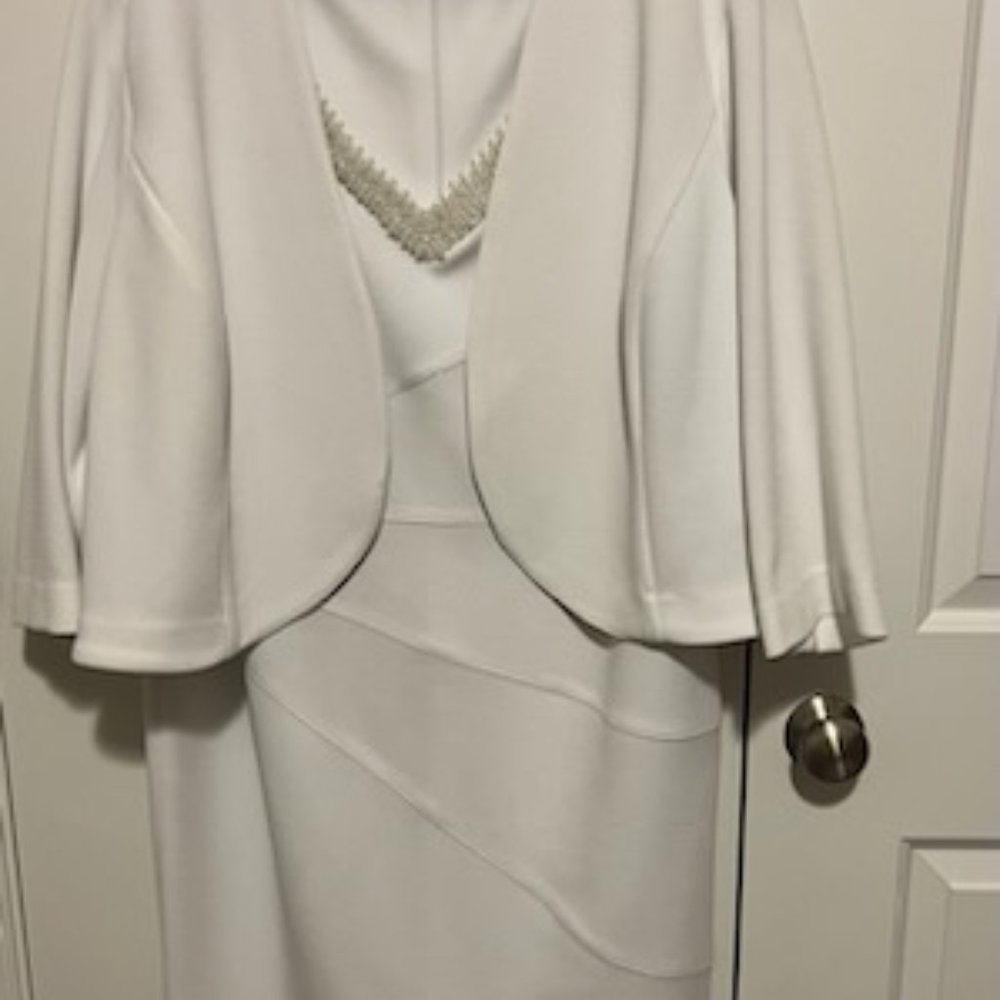 White Maya Brooke dress matching jacket. Pearl detail in V-Neck setting.